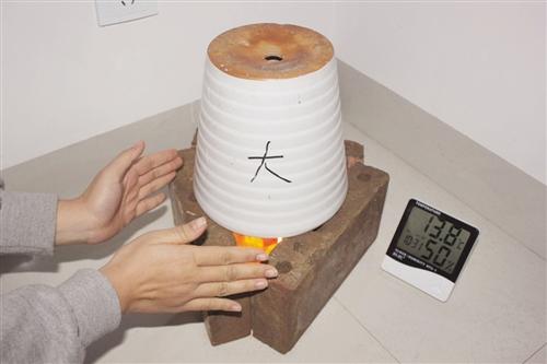 大學生用蠟燭花盆自制取暖神器 40分鐘升溫12.5℃