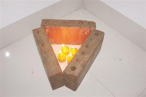 大學生用蠟燭花盆自制取暖神器 40分鐘升溫12.5℃